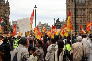 Indians living in the UK held a protest in London to demonstrate against an unprovoked attack in India on Yoga teacher Baba Ramdev, along with many of his supporters, by a group of police who had allegedly been drinking. UK. 19th June 2011